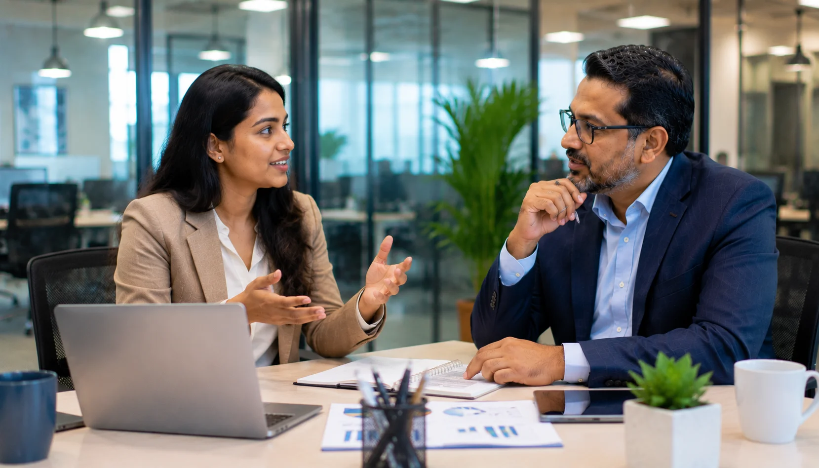 Product Owner and Product Manager discussing average salary and career growth with a senior mentor in a modern office.